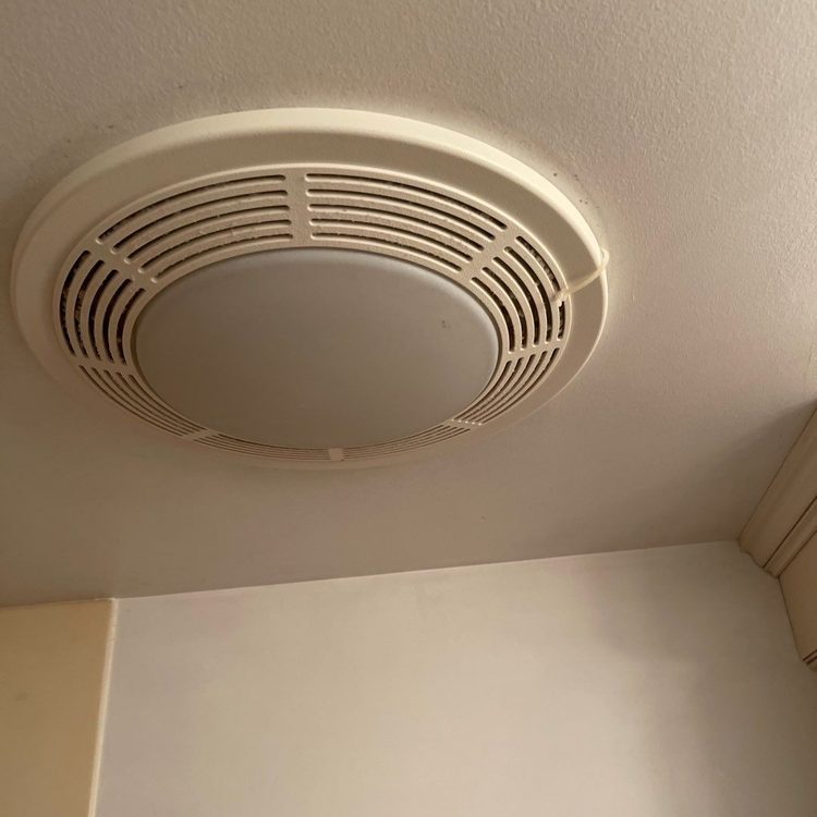 Ceiling vent cleaned during an air duct service